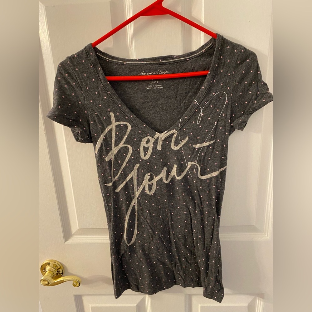 Nice t-shirt with “bon jour” slogan across the front. Size XS